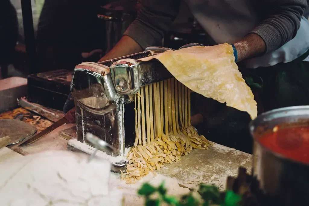 Make pasta by hand in Italy